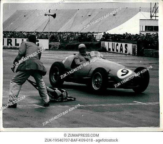 Jul. 07, 1954 - Gonzales Wins The British Grand Prix At Silverstone. Crosses The Line: Gonzales the Argentine champion driving an Italian Ferrari win the...