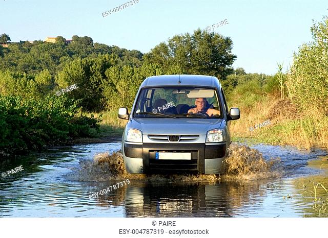 Vehicle in The Floods
