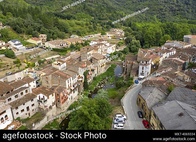 Aerial view of the village of Osor, in the wooded region of Les Guilleries (La Selva, Girona, Catalonia, Spain)