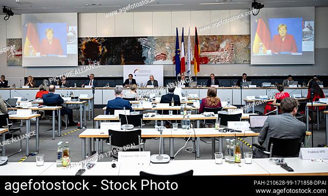 28 June 2021, Berlin: German Chancellor Angela Merkel (CDU) is joining the last meeting of the Franco-German Parliamentary Assembly of this Bundestag election...