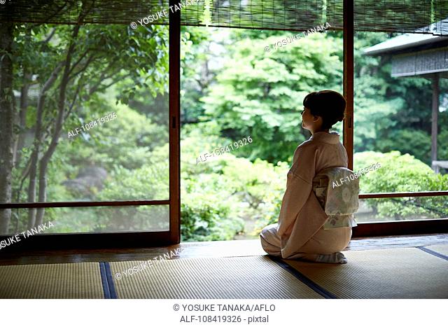 Young Japanese woman wearing traditional kimono