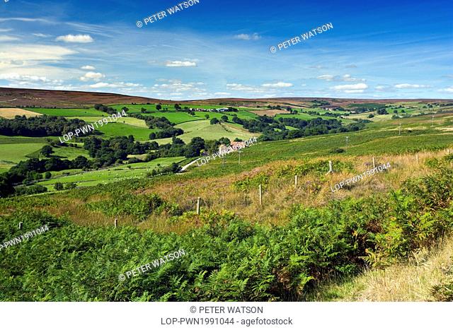 England, North Yorkshire, Commondale Moor. Looking across Commondale Moor towards distant heather-clad hills