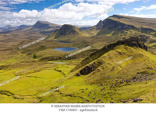 View from The Quiraing, a landslip on the eastern face of Meall na Suiramach over Loch Leum na Luirginn and Loch Cleat, the northernmost summit of the...