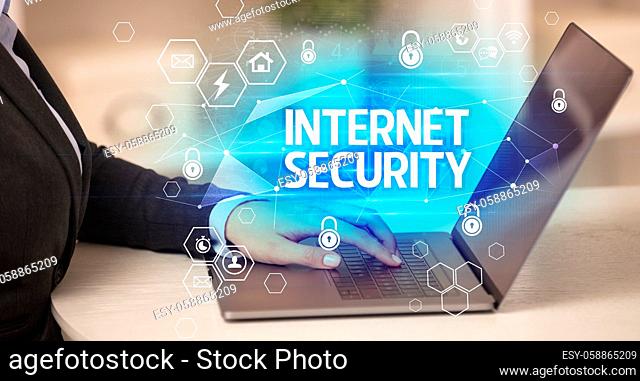 INTERNET SECURITY inscription on laptop, internet security and data protection concept, blockchain and cybersecurity