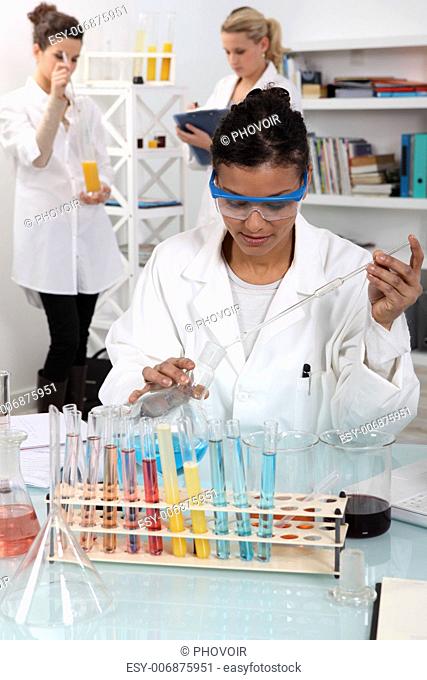 Women conducting an experiment