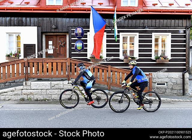 People (tourists, cyclist) vote during elections to the Chamber of Deputies of the Parliament of the Czech Republic, on October 9, 2021, in Bedrichov