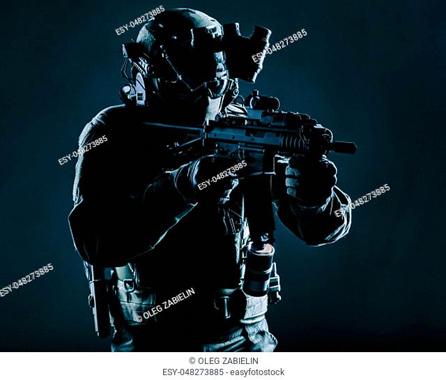 Army special operations squad soldier, police counter terrorism assault team member, security service rifleman in mask, helmet with headset and night vision...