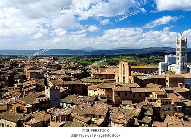 Siena panoramic panorama of the Duomo Cathedral Campanile Belltower and city from Torre del Mangia Tuscany Italy Italia Europe EU