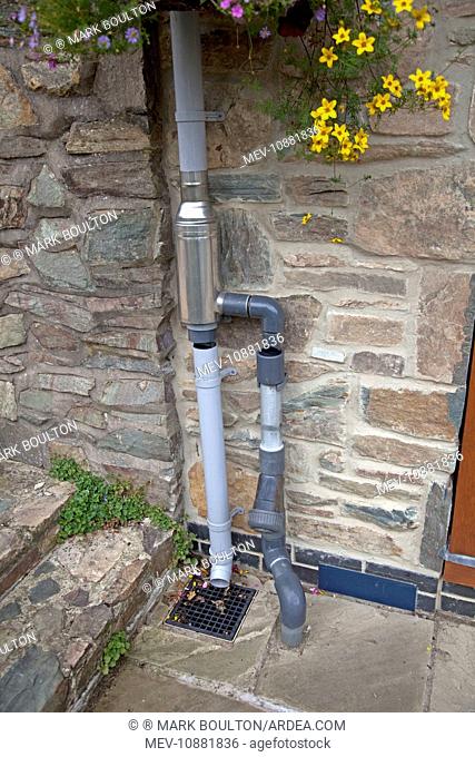 Wisey stainless steel rain water diverter and filter installed in downpipe of eco house