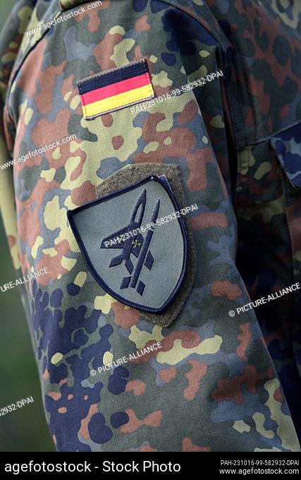 16 October 2023, Saxony-Anhalt, Holzdorf: A fighter plane and a missile can be seen on the troop insignia from the ""Berlin Air Force Command"" at Holzdorf Air...