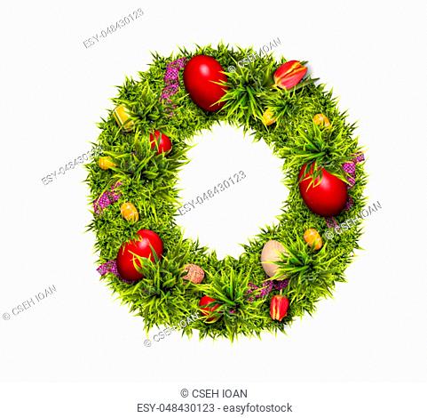 Easter holiday letter O made of fresh green grass and Easter eggs isolated on white background