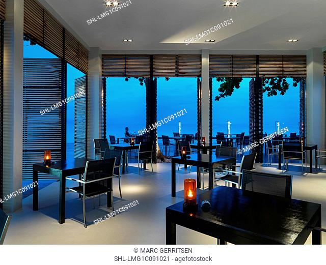Dining area of The Library resort; Hat Chaweng at dusk