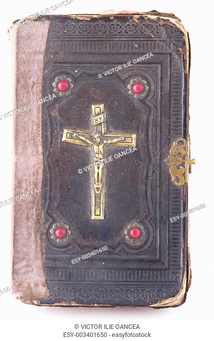 Holy Scripture with crucifix on cover