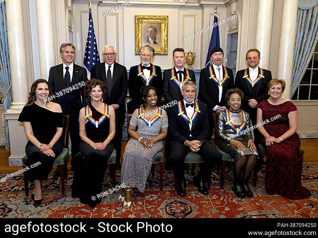 The recipients of the 45th Annual Kennedy Center Honors pose for a group photo following the Artists Dinner at the US Department of State in Washington, D