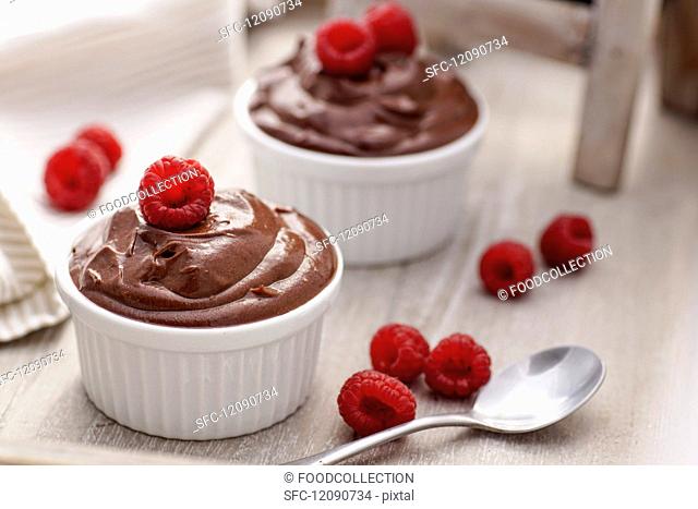 Chocolate cream with avocado and raspberries