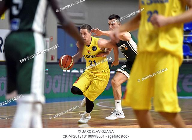Radovan Kouril of Opava, left, and Adas Juskevicius of Nanterre in action during the Men's Basketball Champions League group B first round game Opava vs...