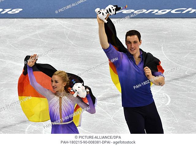 Aljona Savchenko and Bruno Massot from Germany celebrating with a German flag after the award ceremony of the figure skating free skate event of the 2018 Winter...