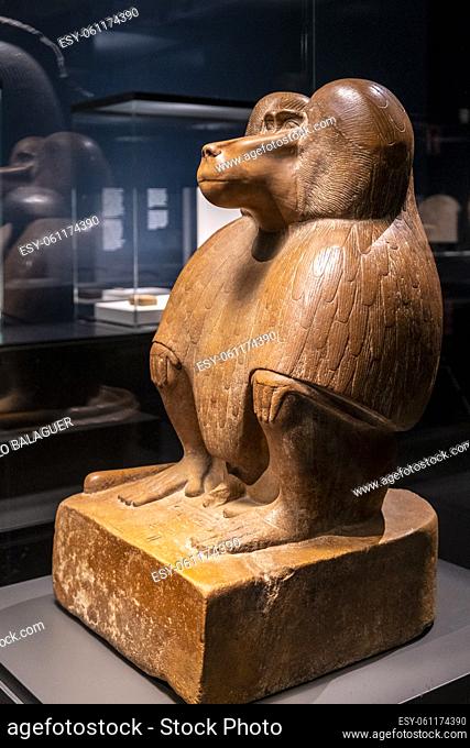 figure of a squatting baboon, red quartzite, 18th dynasty reigning Amenhotep III, collection of the British Museum