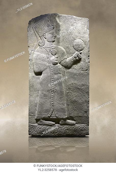 Photo of Hittite relief sculpted orthostat stone panel of Long Wall Basalt, Karkamis, (Kargamis), Carchemish (Karkemish), 900-700 B.C