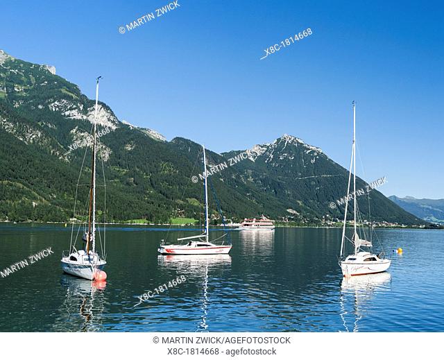 Lake Achensee in Tyrol, Austria  Sailing boats in the harbour of Pertisau  This mountain lake seperates the Karwendel mountain ranges from the Brandenberger...