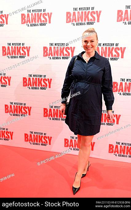 02 November 2023, North Rhine-Westphalia, Cologne: Fitness coach Mareike Schneider attends the opening of the exhibition "" The Mystery of Banksy - A Genius...