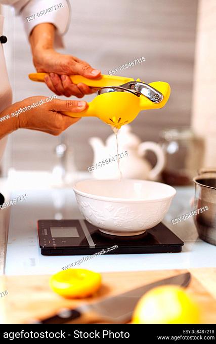 Preparation of lemon pie filling in home kitchen