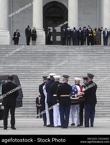A U.S. military honor guard carries the casket of civil rights pioneer and longtime United States Representative John Lewis (Democrat of Georgia)