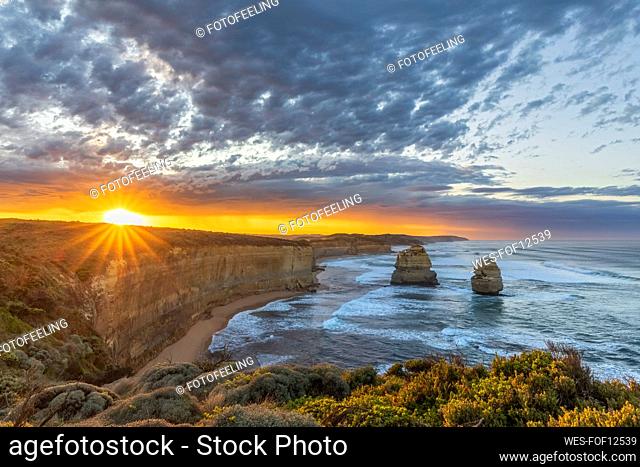 Australia, Victoria, View of Twelve Apostles and Gibson Steps in Port Campbell National Park at sunrise