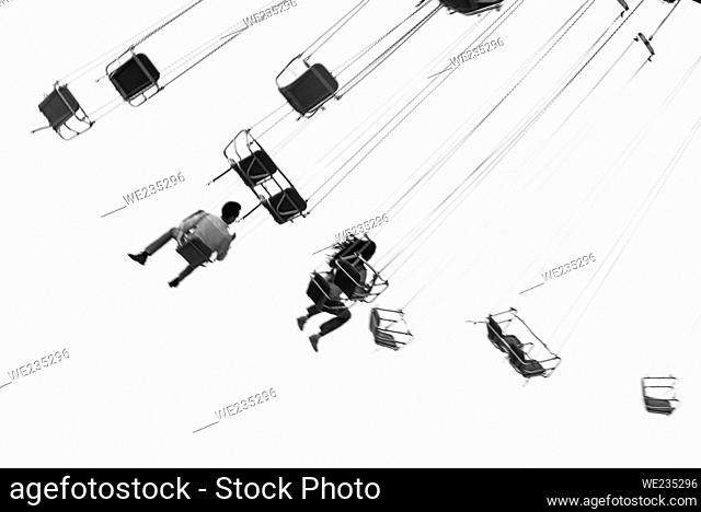 Group of people enjoying a ride on the chairlifts at the amusement park at Navy Pier in Chicago, Illinois, USA