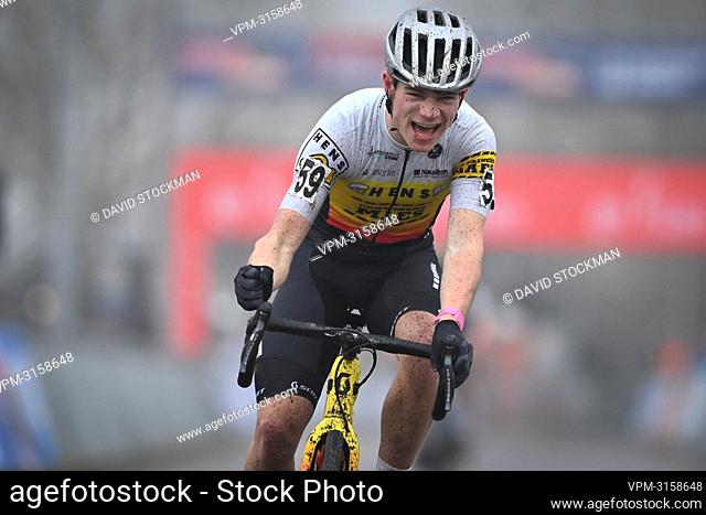 Belgian Ferre Urkens celebrates as he crosses the finish line to win the junior race at the Cyclocross World Cup cyclocross event in Rucphen, The Netherlands