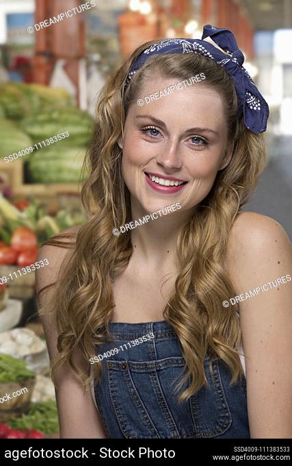 Smiling woman shopping at farmers market