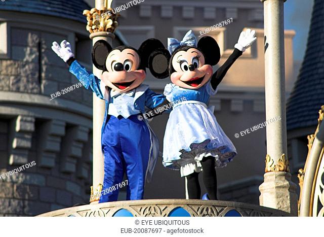 Walt Disney World Resort. Mickey and Minnie Mouse characters on stage in the Magic Kingdom