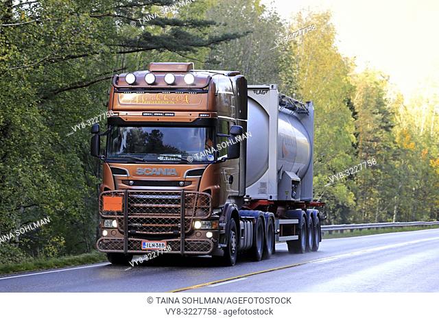Salo, Finland - October 5, 2018: Bronze Scania R560 chemical container transport truck of AH Trans Oy on the road on a day if autumn in Finland