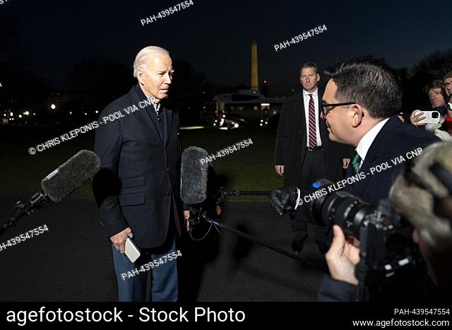 United States President Joe Biden takes a question from CBS Correspondent Ed O'Keefe as he returns to The White House in Washington, DC