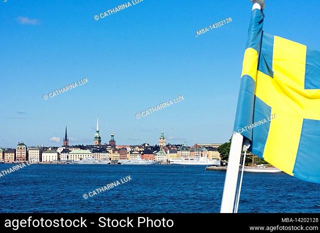 Sweden, Stockholm, steamboat trip, Lake Mälaren, archipelago, view of old town, bleeding Swedish flag