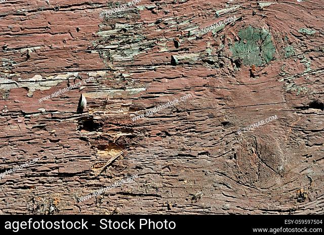 Obsolete weathered cracked brown painted wood background