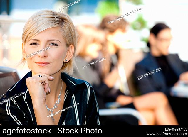 Closeup portrait of attractive businesswoman, thinking
