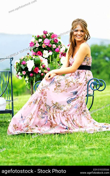 bridesmaid in nature with flowers