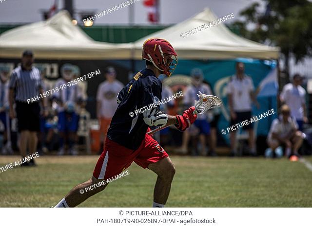 A Spanish player vies for the ball during the 2018 World Lacrosse Championship 29th to 32nd place match between Argentina and Spain at the Orde Wingate...