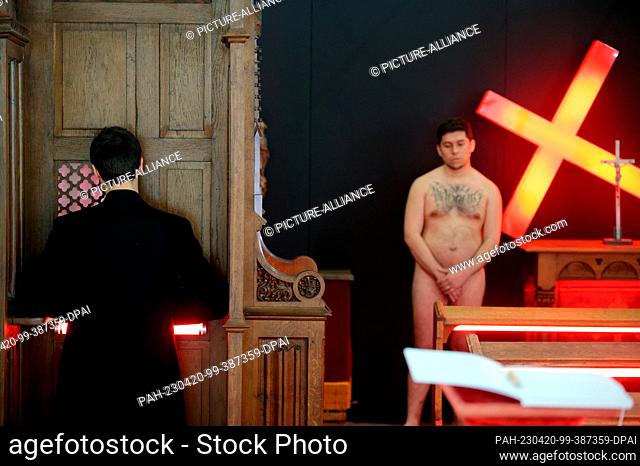 PRODUCTION - 20 April 2023, North Rhine-Westphalia, Cologne: Naked men and a man in a black gown act in an art action. In the staging of the Bonn artist Dennis...