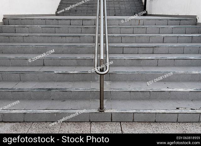 Portrait of empty symmetrical ladder stairway outdoors
