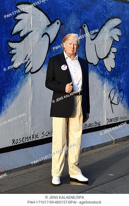 EXCLUSIVE - The wax figure of USÂ president Donald TRump can be seen at the East Side Gallery along the remains of the wall in Berlin, Germany, 17 October 2017