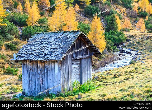 Old weathered shed by the creek