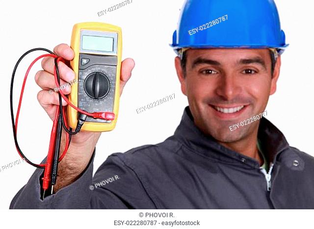 Electrician holding voltmeter