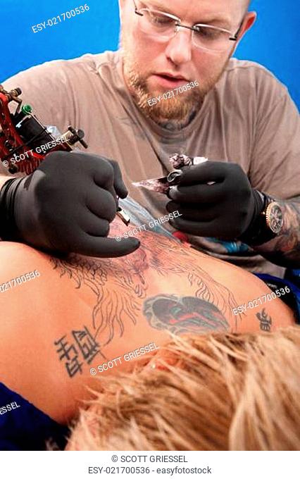 Tattoo Artist and Customer