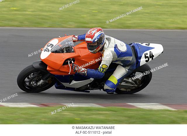 Racing motor bike cornering