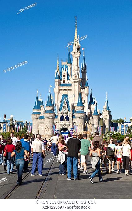 Kissimmee, FL - Nov 2009 - Park guests on a crowded Main Street in front of Cinderella's Castle in Walt Disney's Magic Kingdom theme park
