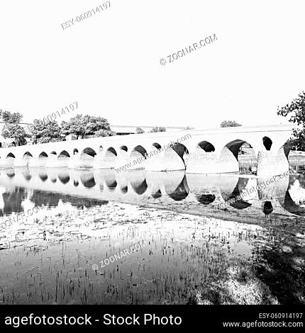 blu in iran the old bridge and the river antique construction near nature