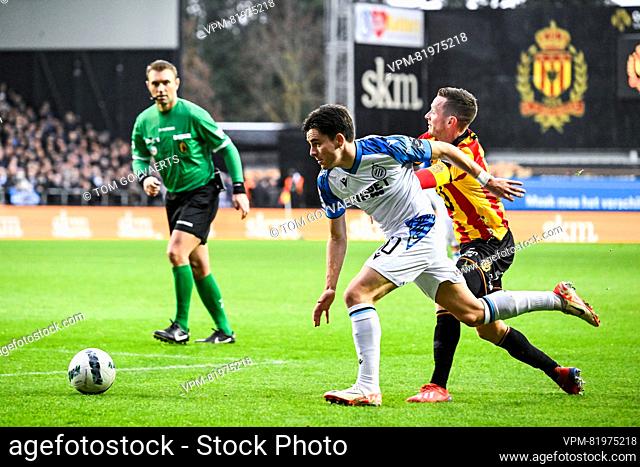Club's Hugo Vetlesen and Mechelen's Rob Schoofs pictured in action during a soccer match between KV Mechelen and Club Brugge KV Sunday 10 December 2023 in...