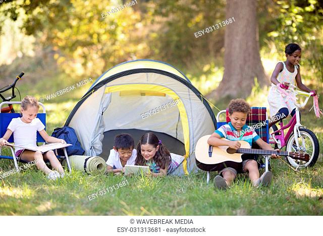 Children enjoying at campsite